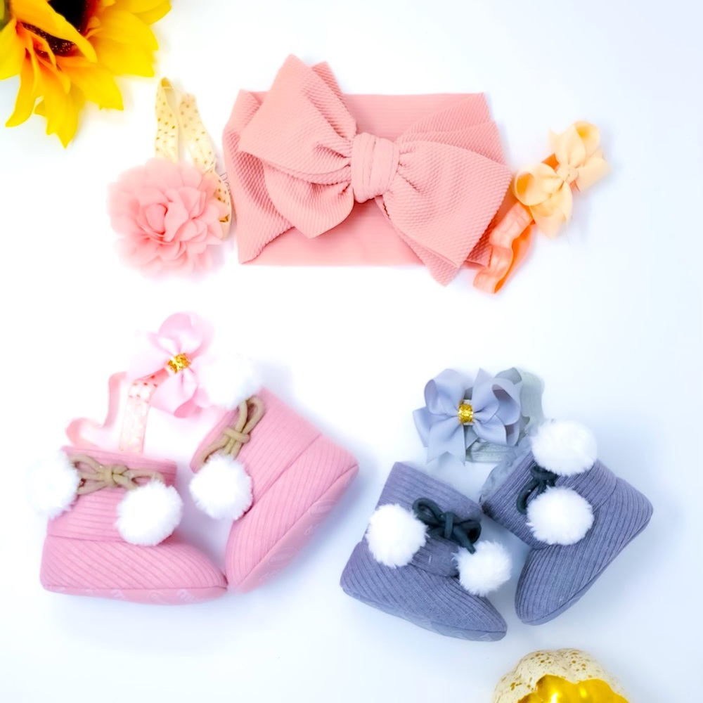 A bundle of bows and booties. New born to 3 months old. (New)